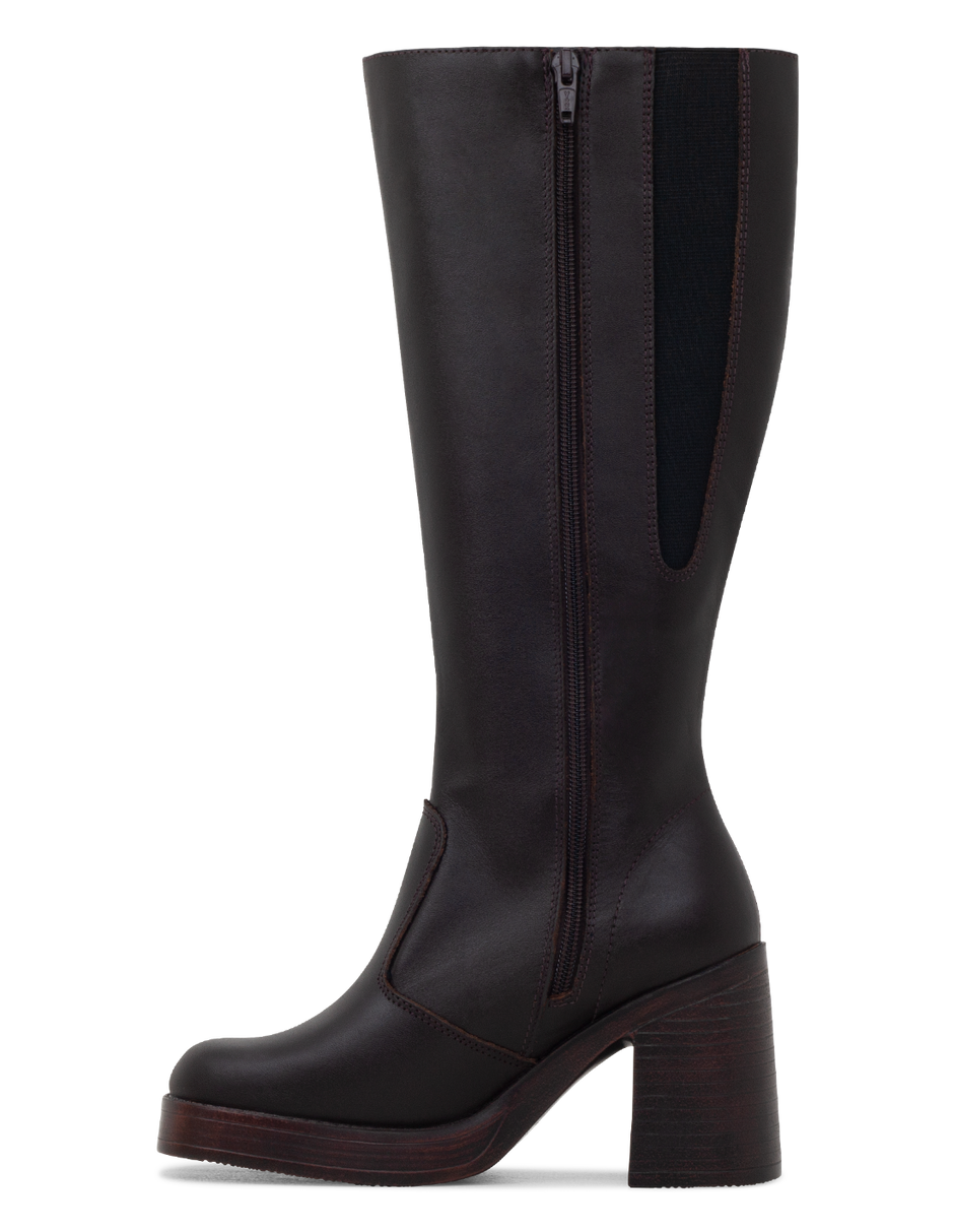 Brown knee-high boot with a platform sole on a white background