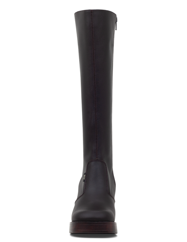 Brown knee-high boot with a platform sole on a white background